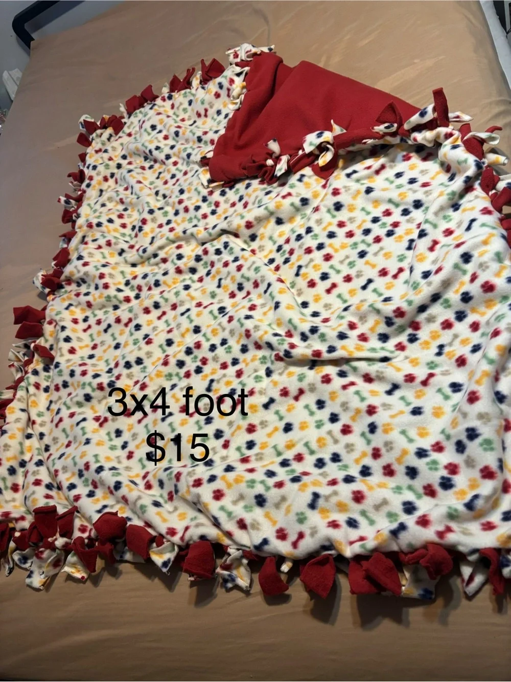 Cozy Kids Fleece Tie-Edge Blanket - White with Colorful Paw Prints and Red Trim
